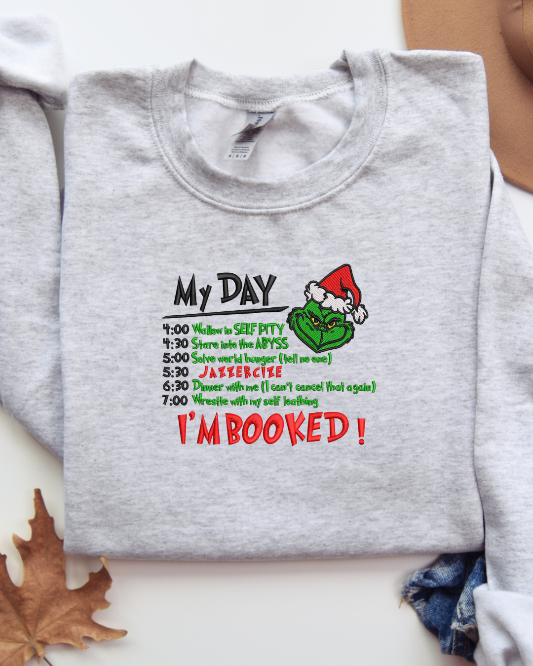 I'm Booked Grinch Crewneck